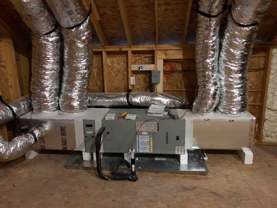 New furnace and insulated ductwork installation in an attic by Apache Air & Heat in Blanco, TX